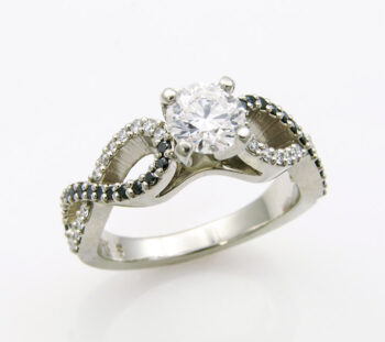 white gold custom made engagement ring with one diamond