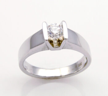 white gold engagement ring with one diamond